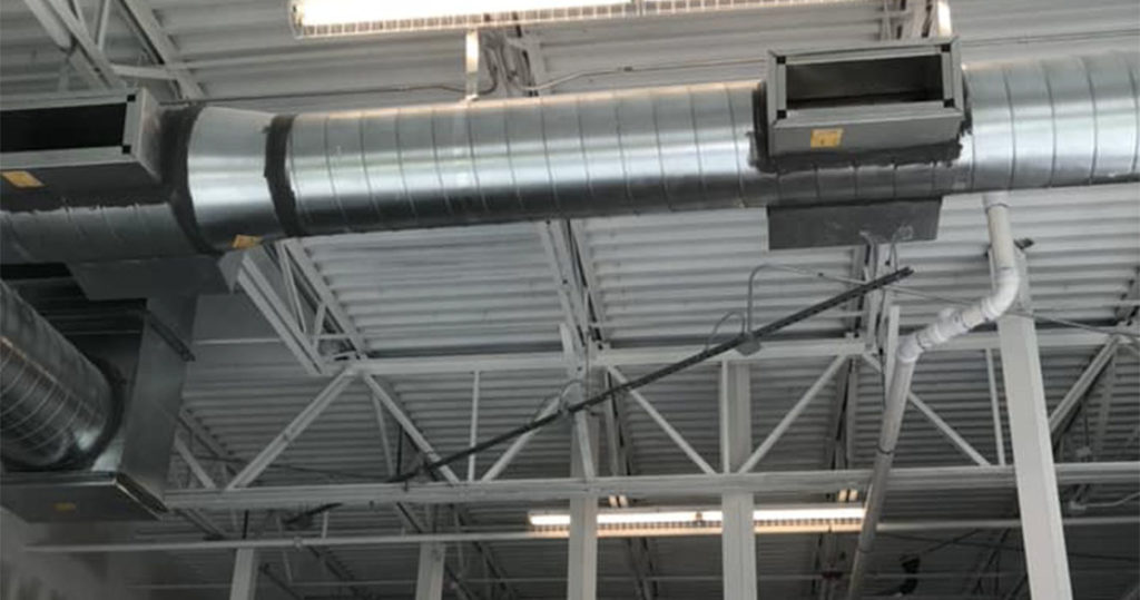 Installation spiral exposed ductwork Triumph A/C & Refrigeration Corp